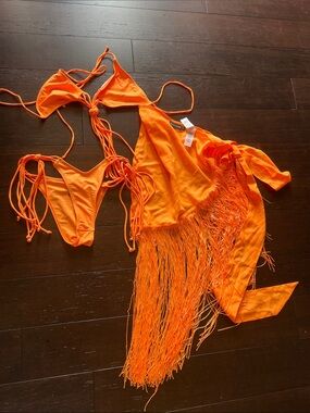 PrettyLittleThing Neon Orange String Bikini & coverup skirt.